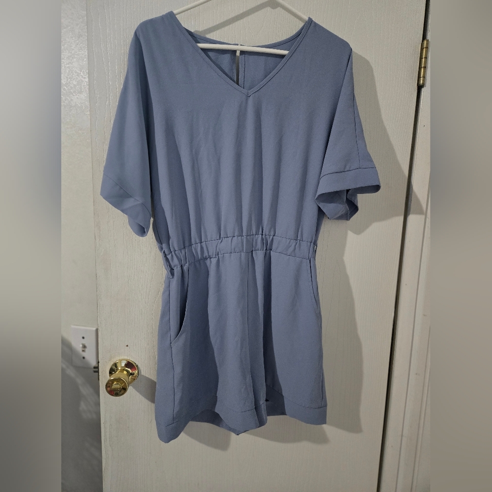 Medium Light Blue V-Neck Short Sleeve Romper. Missing The Belt.